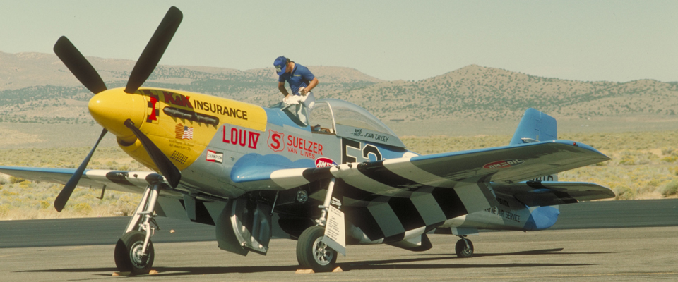 yellow striped plane on lading strip