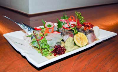 plate of sushi and sea food