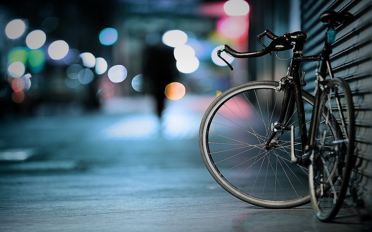 bicycle up against a wall