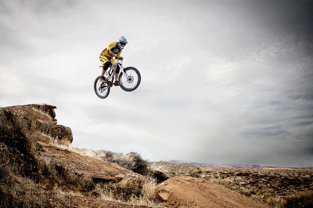 Person mountain biking